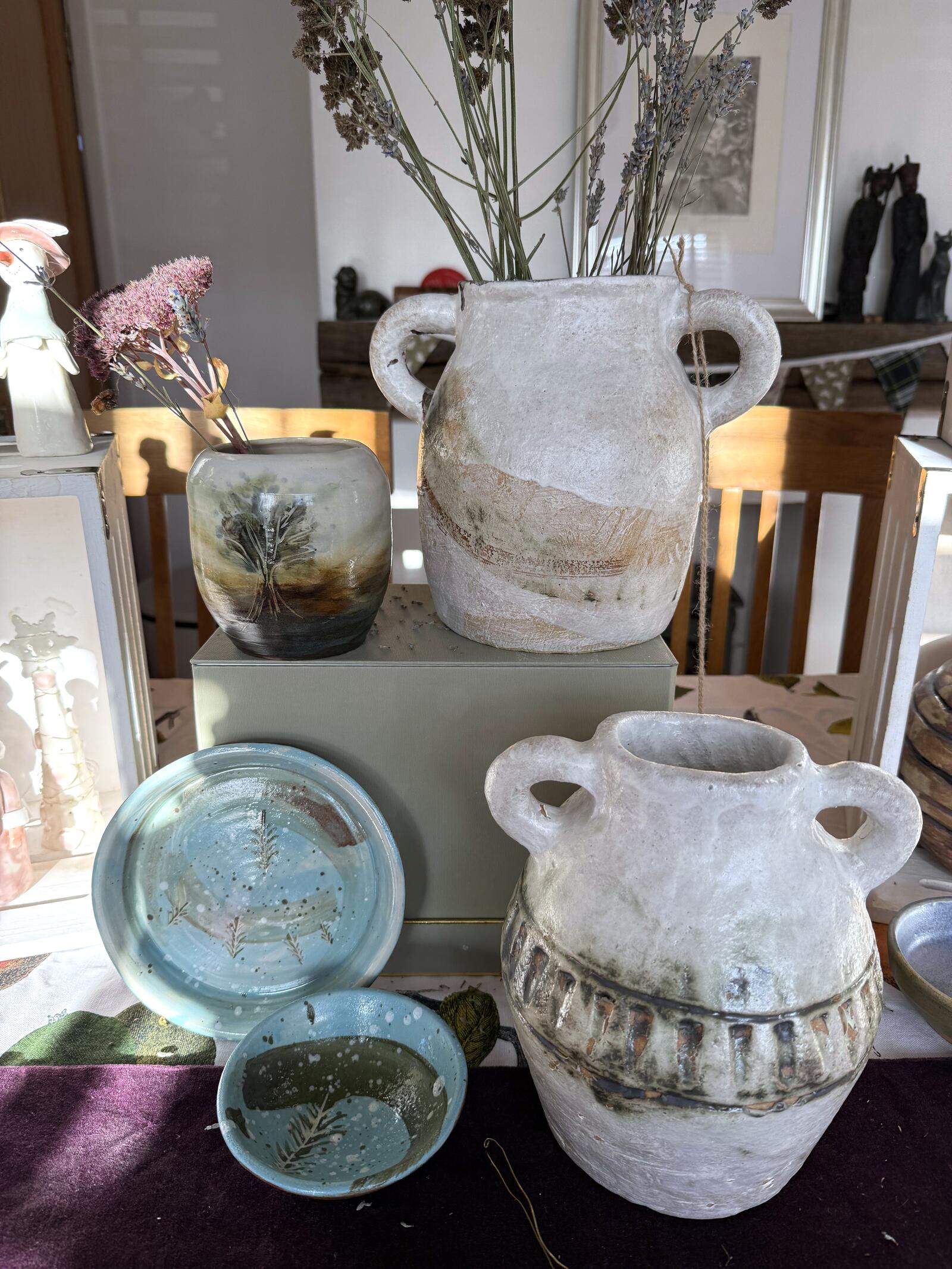 A grouping of Merrinda Lissaman's hand-thrown ceramic vessels and dishes